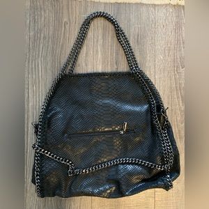 From Florence, Italy. Black textured leather shoulder bag, chain shoulder